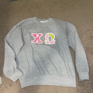 Chi Omega paisley stitched letters crewneck